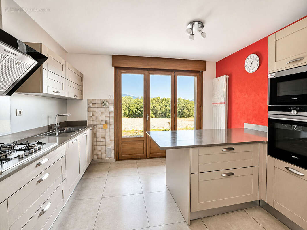 Maison individuelle à vendre 106 m², 3 chambres, sous-sol complet et terrain arboré de 2 000 m² - photo 9