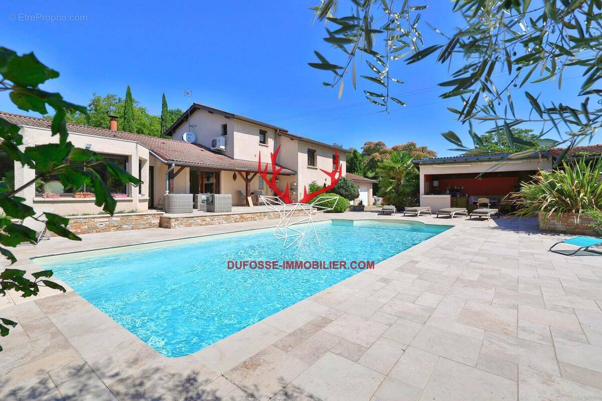 Photo 1 - Maison à JASSANS-RIOTTIER