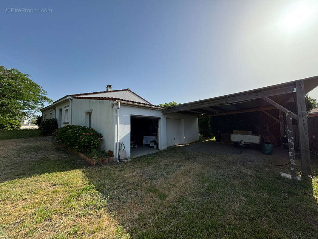 Maison familiale de plain-pied 129 m²  DIVATTE SUR LOIRE - photo 5