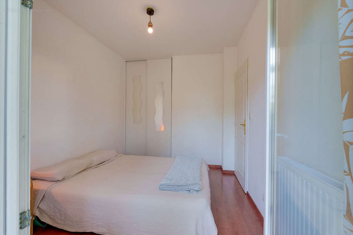 Appartement 3 pièces 60.02 m²  loi Carrez avec cave et garage en centre ville d'EVIAN-LES-BAINS - photo 2