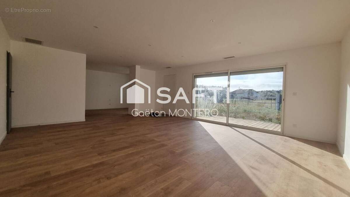 Photo 2 - Maison à SAUGNACQ-ET-MURET