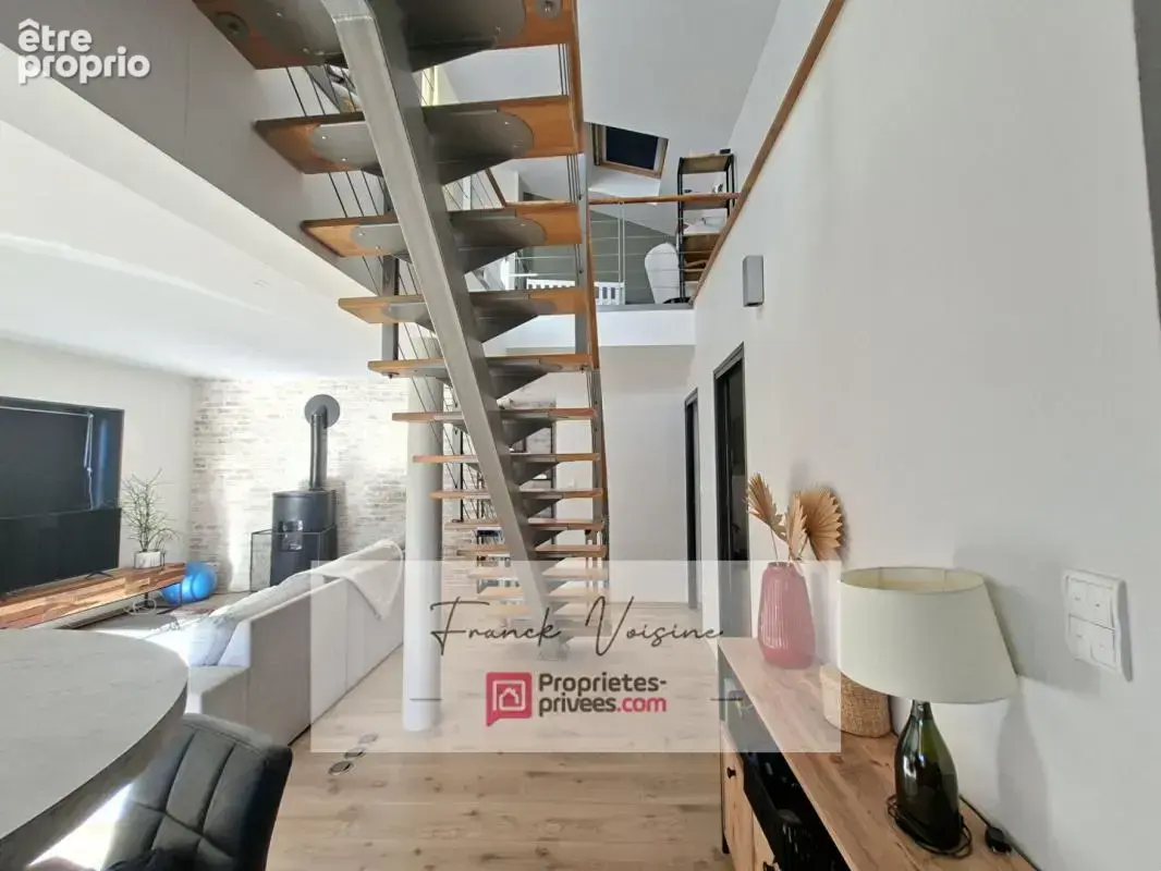 A VENDRE aux Herbiers centre ville, immeuble composé de 2 espaces commerciaux et d'1 appartement duplex de 96 m2 - photo 4