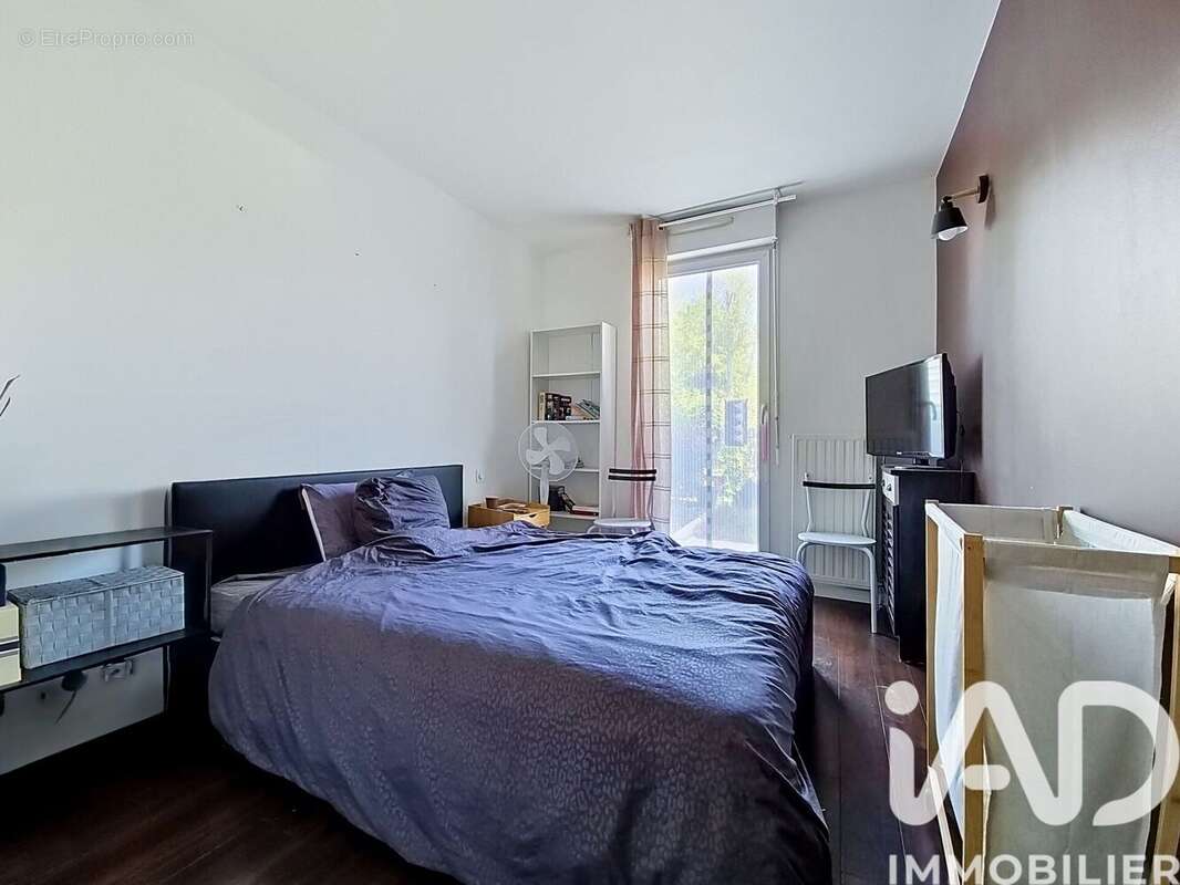 Photo 8 - Appartement à SAINTE-GENEVIEVE-DES-BOIS