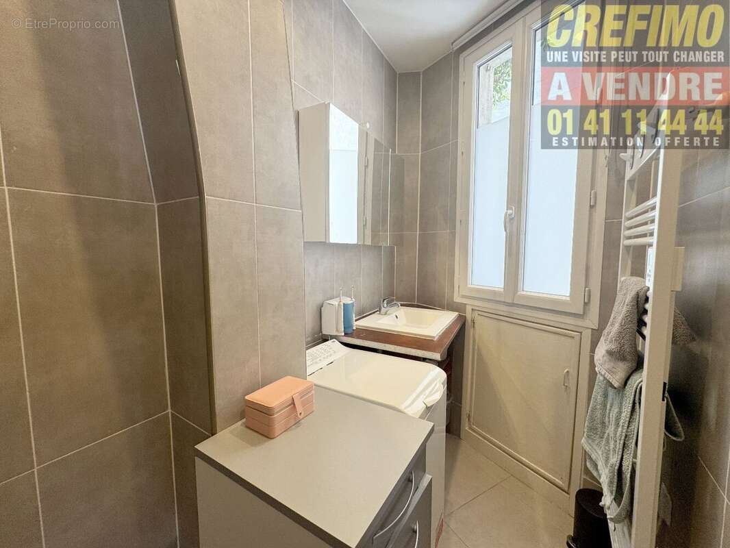 Appartement de caractère avec cachet, belle pièce de vie, cuisine aménagée à Asnières-sur-Seine. - photo 10