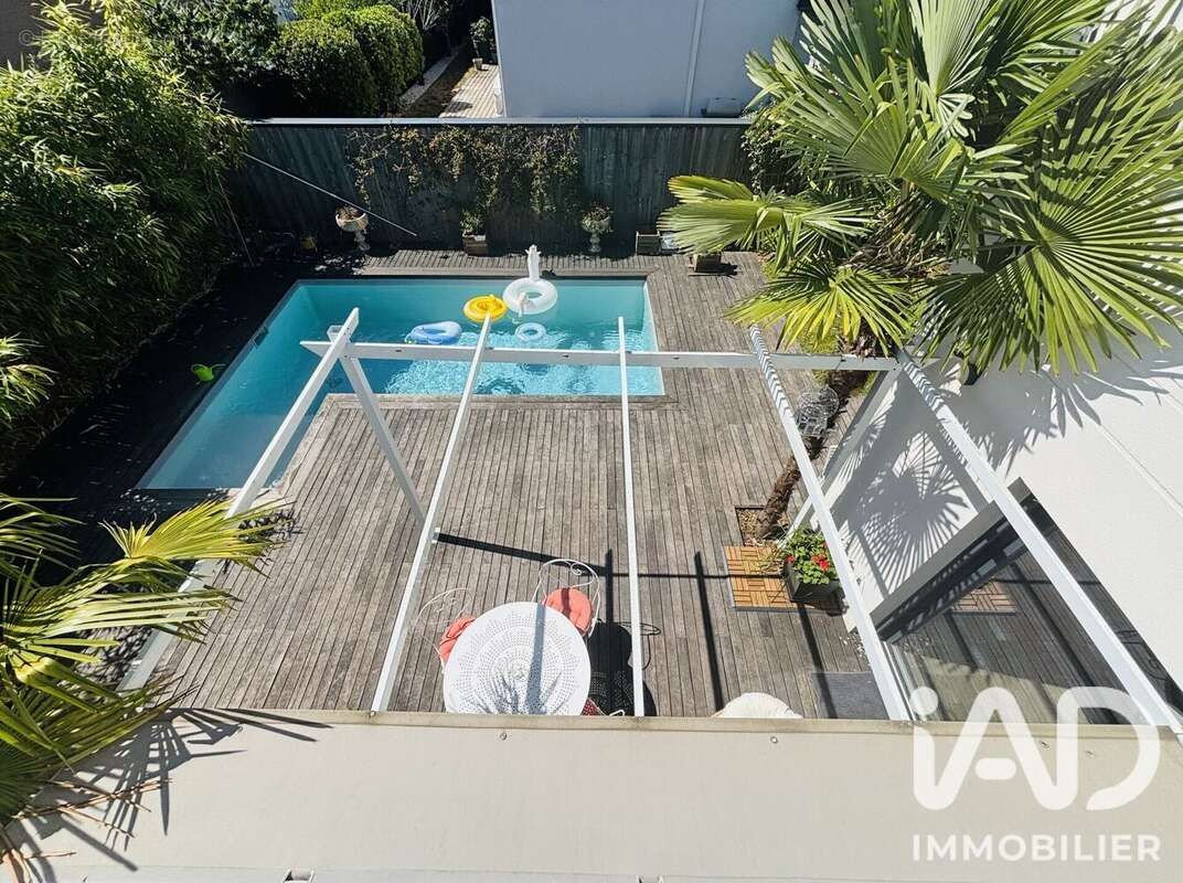 Maison 128 m² à Artigues-Pres-Bordeaux  - photo 7