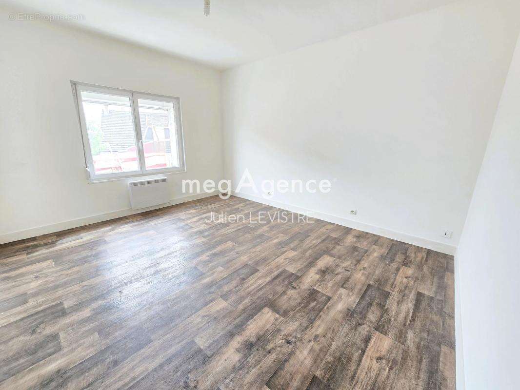 maison de 5 pièces de 122m² - photo 4