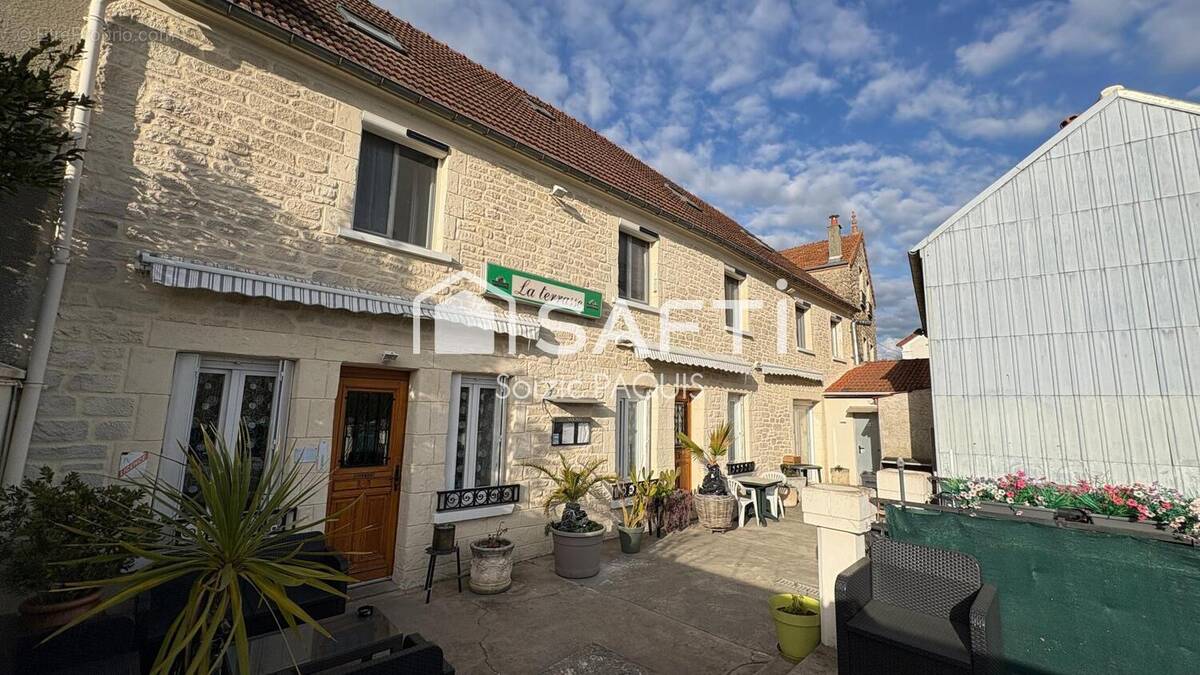 Photo 1 - Commerce à LA FERTE-SOUS-JOUARRE