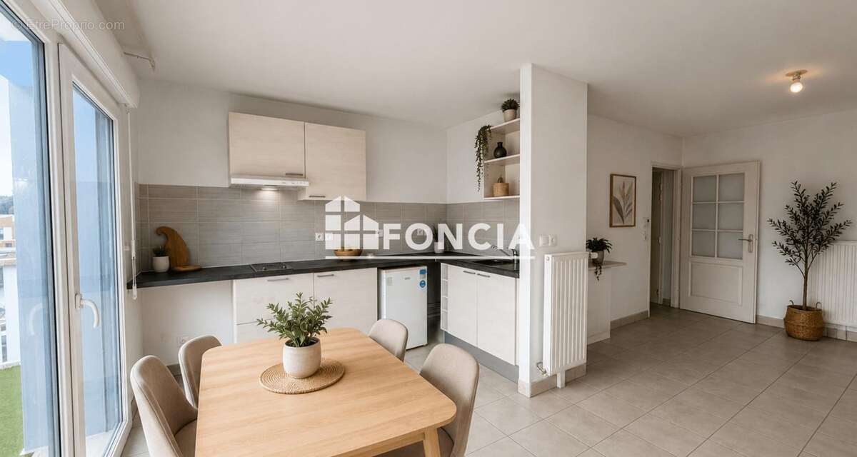 LOOS appartement type 2  avec un grand  balcon et un stationnement en résidence récente - photo 2