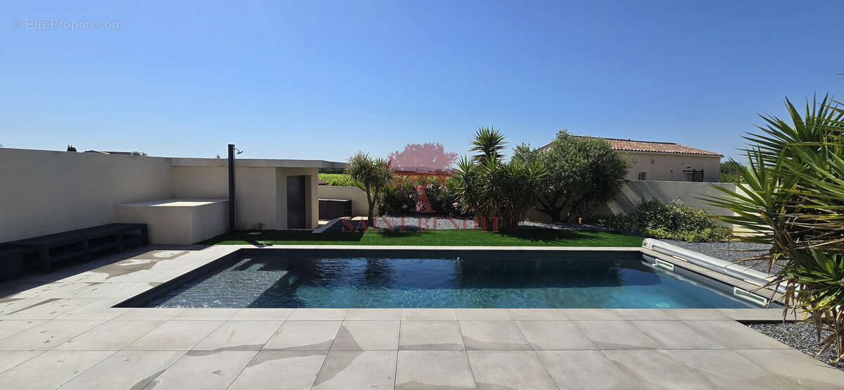 A VENDRE - A JONQUIERES - VILLA CONTEMPORAINE DE TYPE T3 de 129m2 avec garage,  jardin paysagé et piscine - photo 23