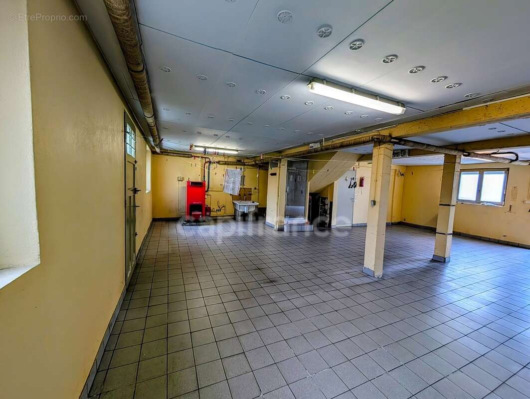 Maison en impasse dans quartier résidentiel, rez de chaussée à aménager, grand garage, à GUIPAVAS (29) - photo 16