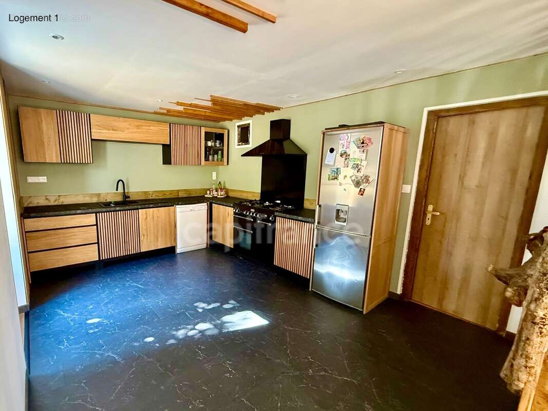 Maison avec deux logements indépendants : une opportunité rare pour habiter, investir ou réunir plusieurs générations - photo 3