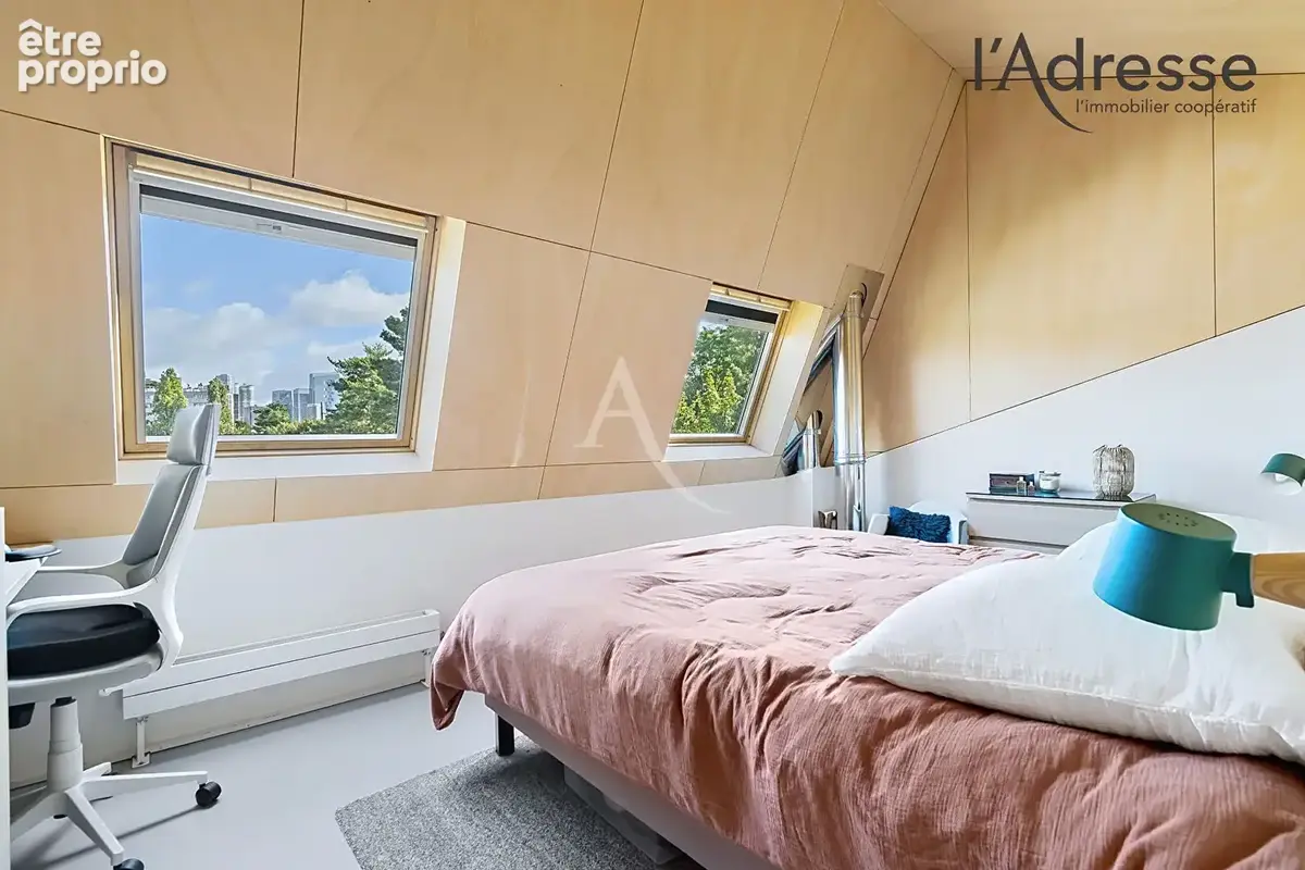 Quartier Liberté - Élégante maison familiale de 103m² (127m² au sol) avec terrasse de 16m² et garage - photo 6