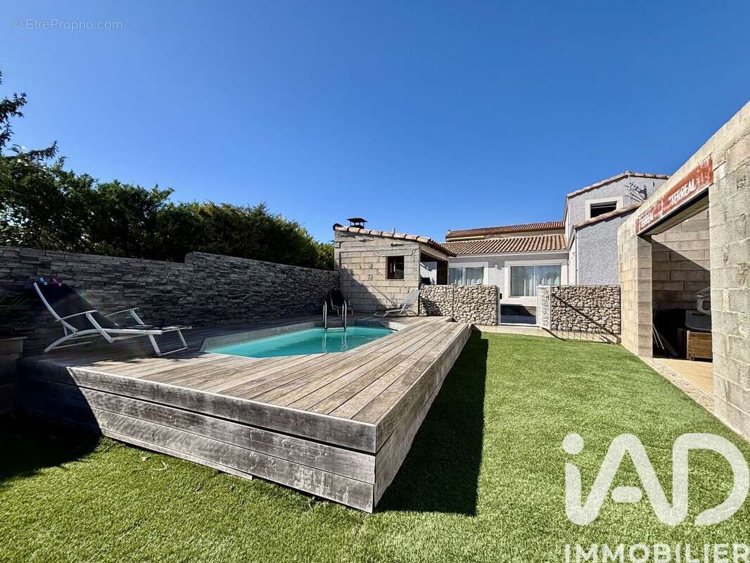 Maison 119 m² à Causses-Et-Veyran  - photo 2