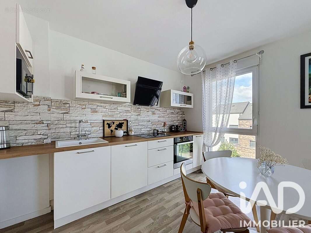 Appartement 61 m² à Louvres  - photo 3