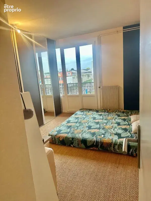 ROANNE Appartement 4 pièces avec balcons et cave - photo 10