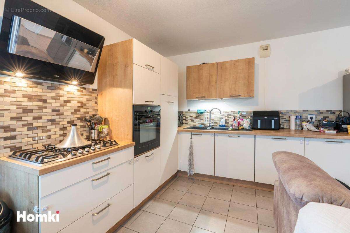 Appartement T4 de 81 m² à Saint-Fons 69190, Rue Robert et Reynier - photo 3