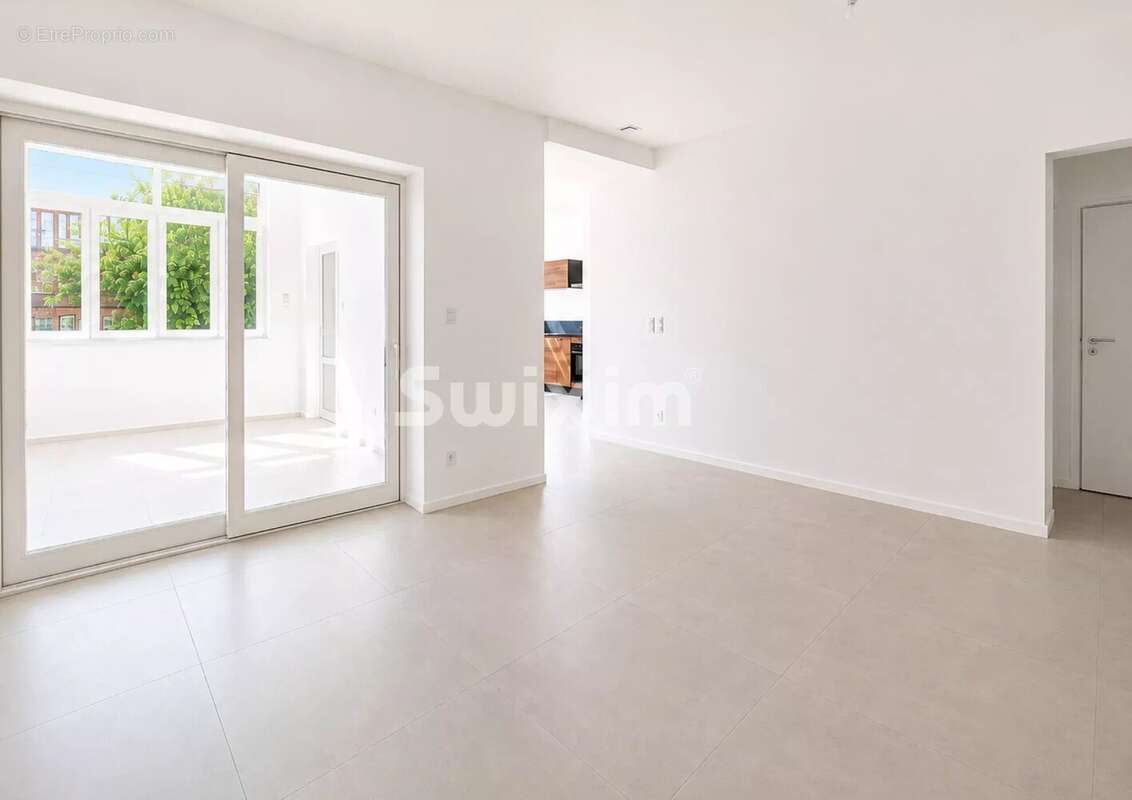 T3 de plain-pied avec jardin privatif, loggia et prestations de confort - photo 3