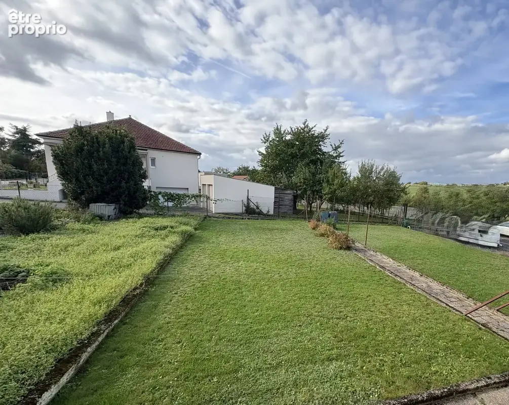 Maison mitoyenne avec jardin et garage. - photo 11