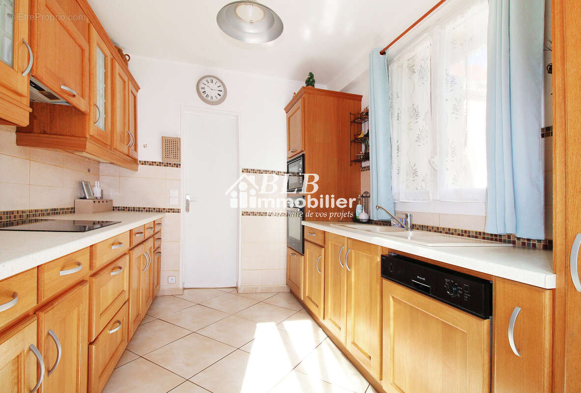 Maison de plain-pied 94m2  3 chambres + garage - photo 7