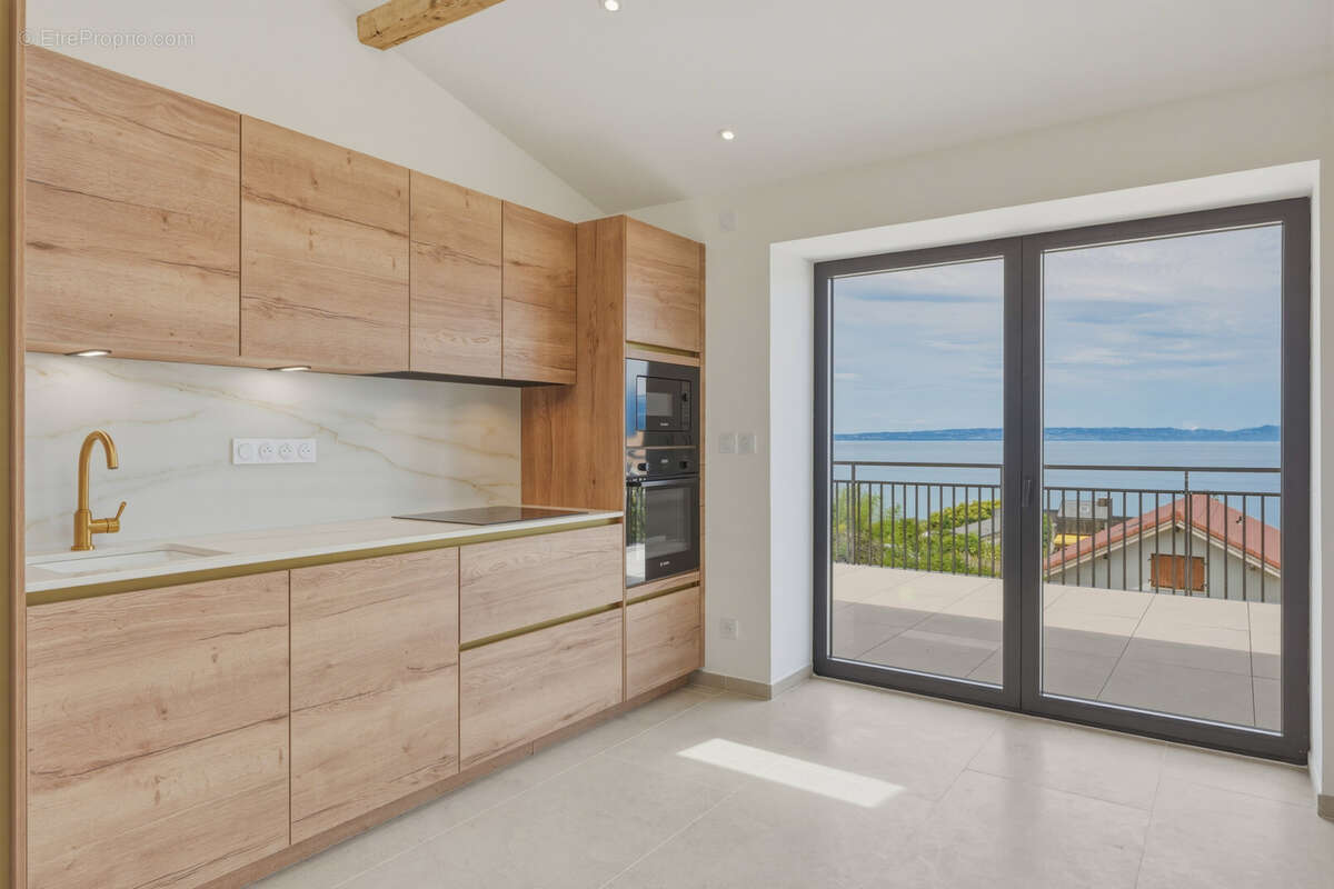 Exclusivité - Appartement en attique 4 pièces de haut standing au bord du Lac Léman - photo 4