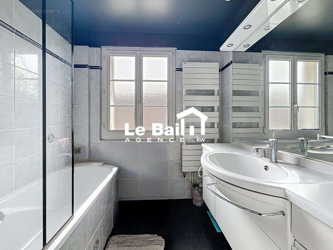 Maison 152 m² à Osny  - photo 7