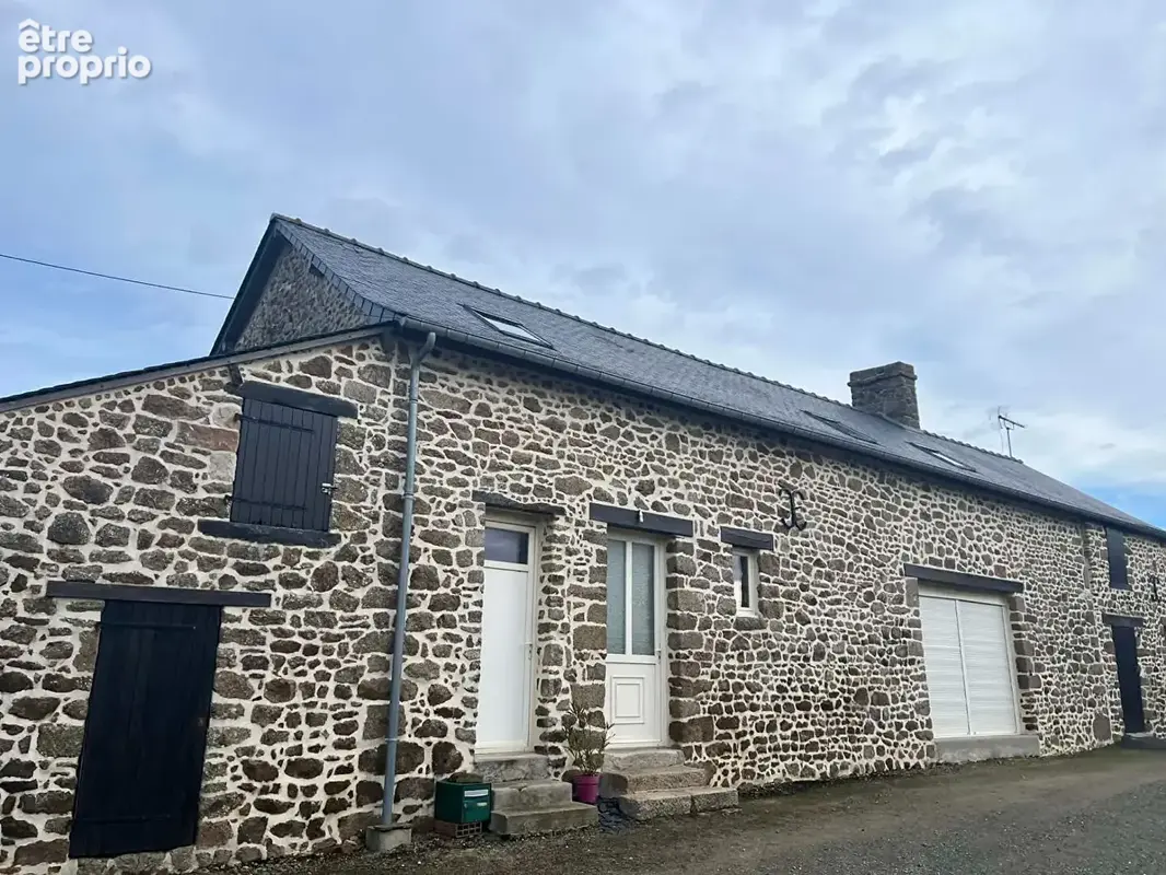 Maison à JUVIGNE