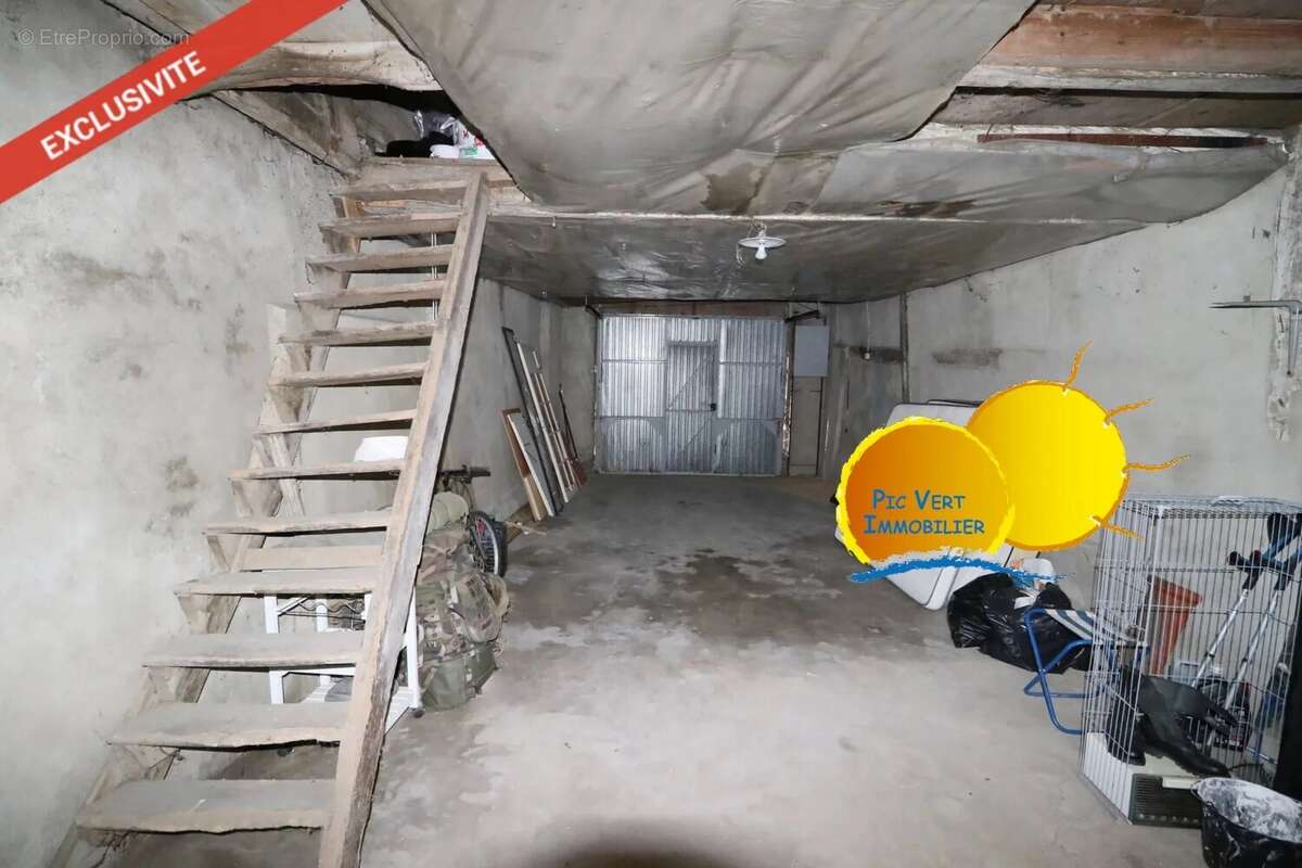 Immeuble avec commerce et 3 appartements, greniers, patio, garage - photo 14