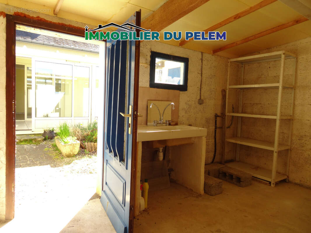 Maison de village avec jardin, garage et vue dégagée   un potentiel à révéler au cœur de Plelauff - photo 12