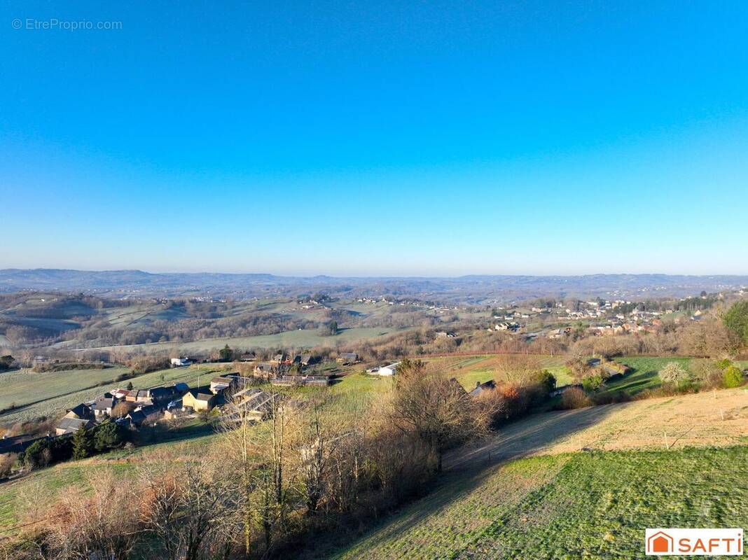 Photo 1 - Terrain à VOUTEZAC