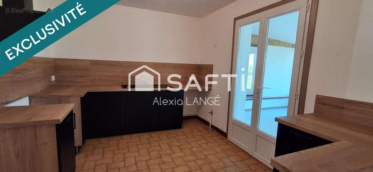 Photo 4 - Maison à CROUZILLES