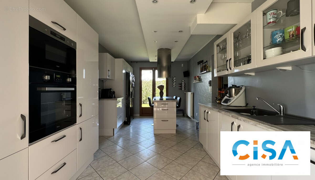 Maison à MOGNEVILLE