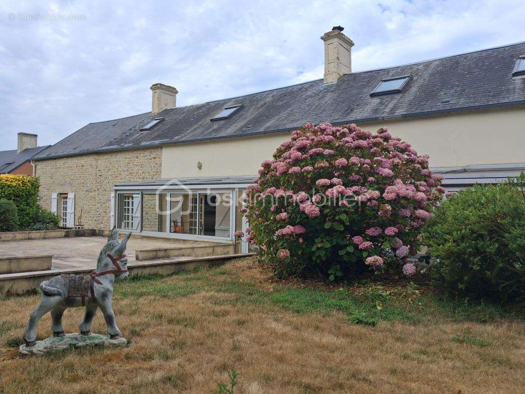 Maison Le Breuil En Bessin de 219 m² - photo 14