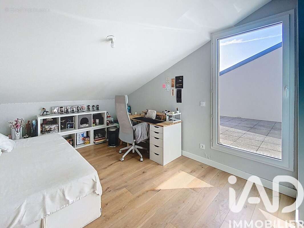 Photo 7 - Appartement à VOISINS-LE-BRETONNEUX