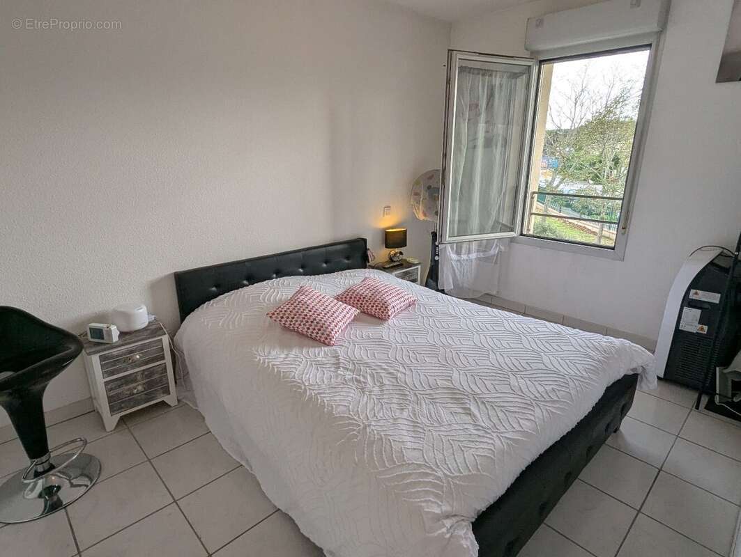 Appartement T3 57.74 m² avec balcon et piscine - photo 6