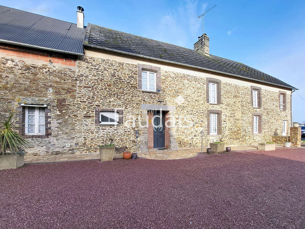 Maison à QUIBOU