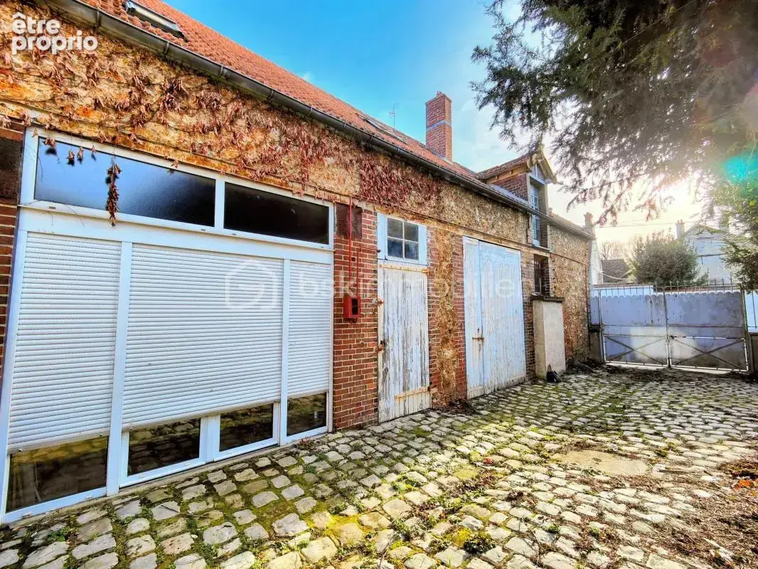 Ensemble immobilier (local commercial + appartement) plein centre ville - photo 9