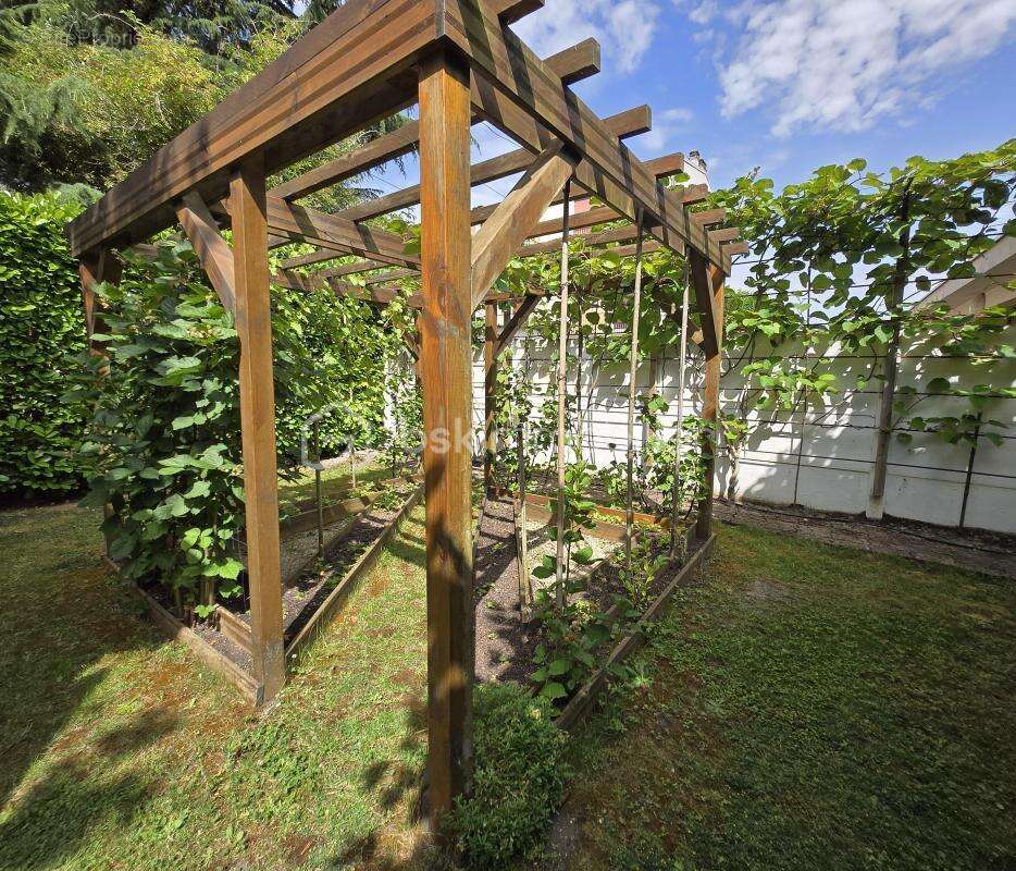 Plain-pied 113 m² - Véranda de 20 m² - Jardin clos - Stationnement 5 véhicules - photo 15