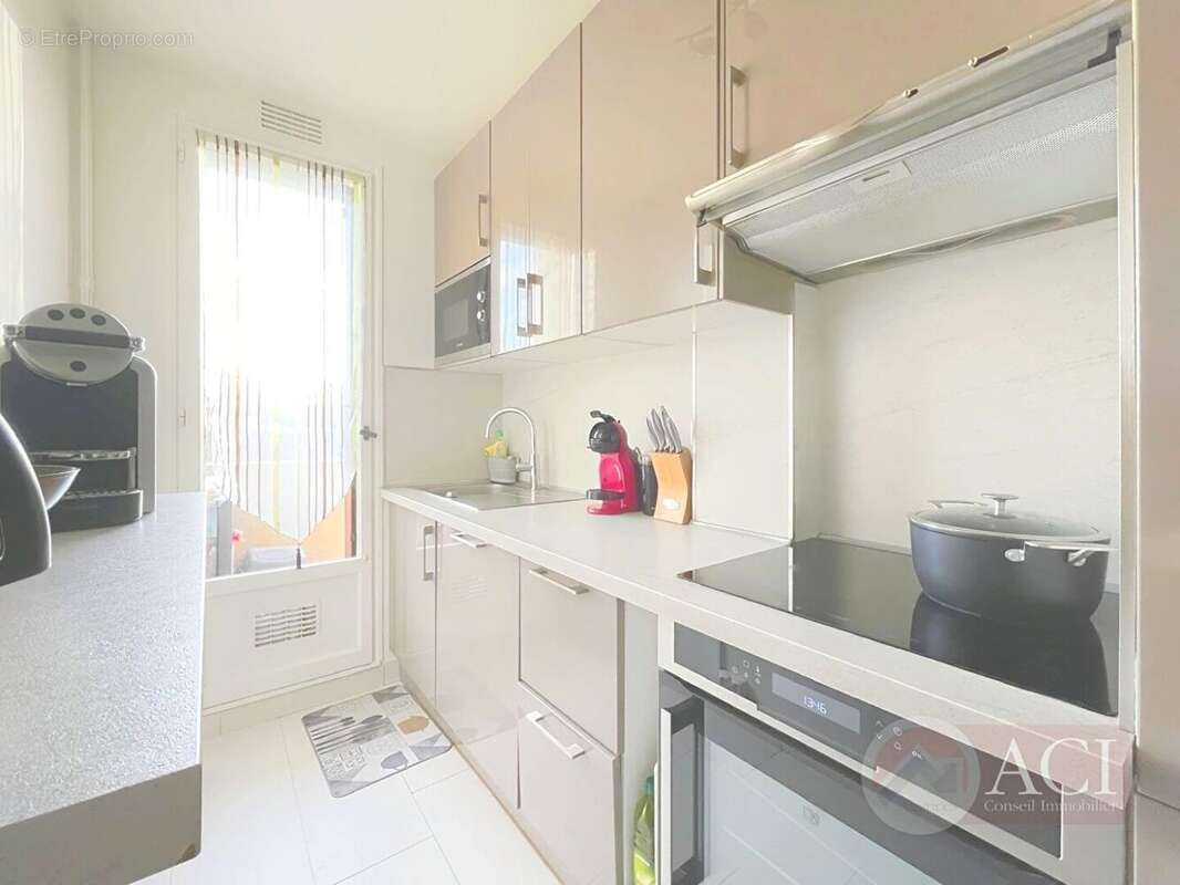 57891319b.jpg - Appartement à EPINAY-SUR-SEINE