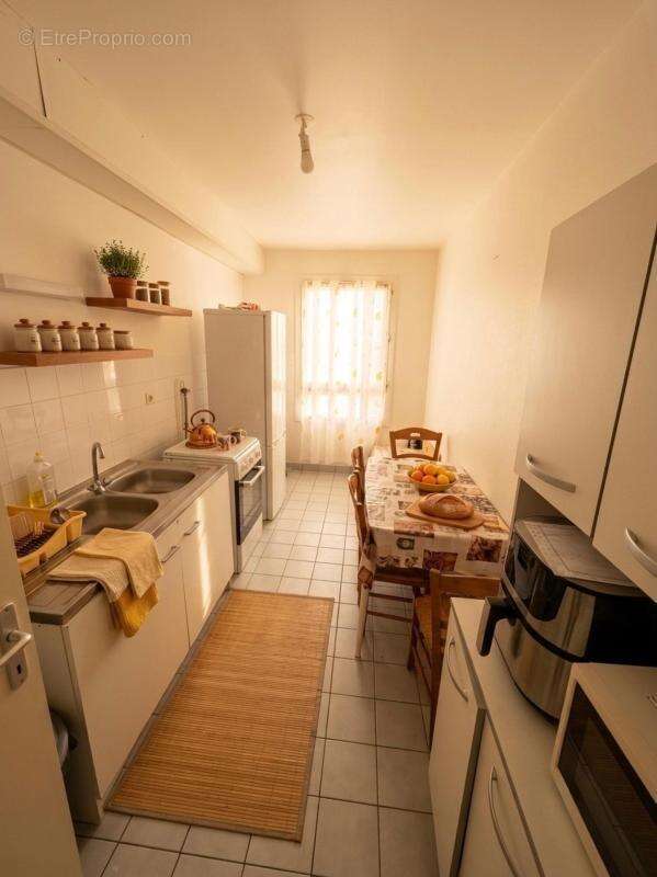 ROUEN RIVE GAUCHE - T3 Lumineux de 71m² avec Balcon et Box Fermé - Idéal Famille ou Investissement (800€/mois) - photo 4