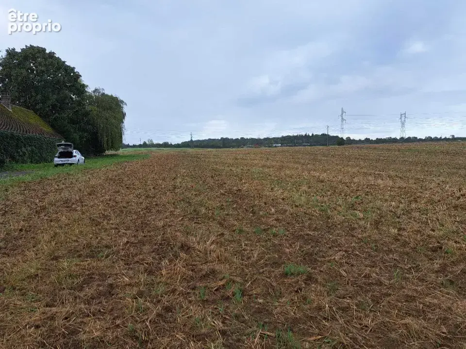 Photo Terrain à Longueil-Sainte-Marie au prix de 115 000€