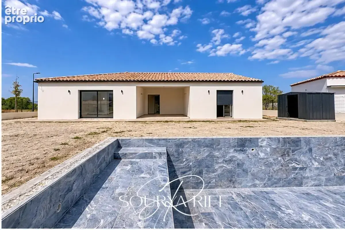 Maison de plain-pied avec climatisation, piscine et garage - photo 8