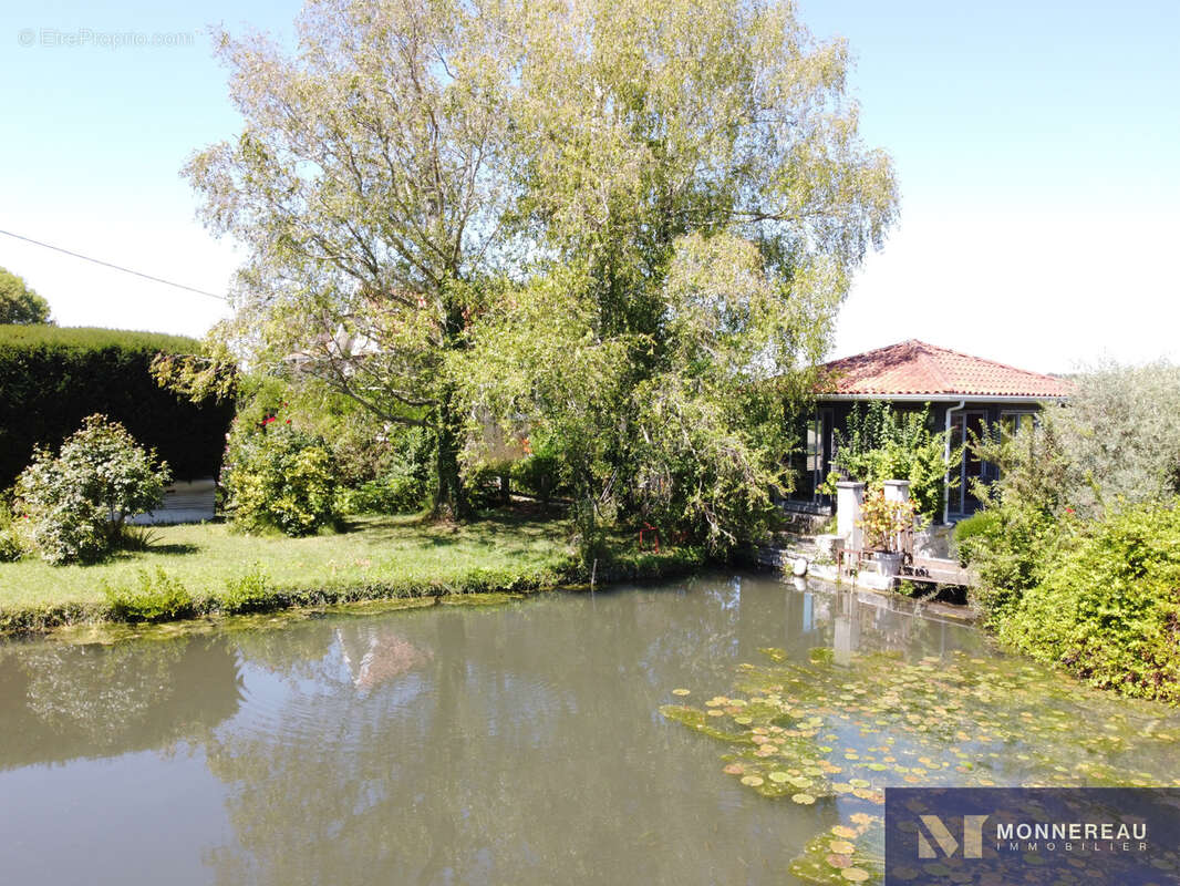 Propriete avec etang et 1 hectare de terrain - photo 16