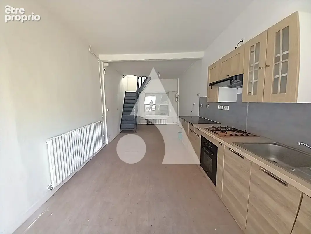 Immeuble de rapport à Maubeuge : 5 logements, un commerce et un potentiel locatif à étudier - photo 15