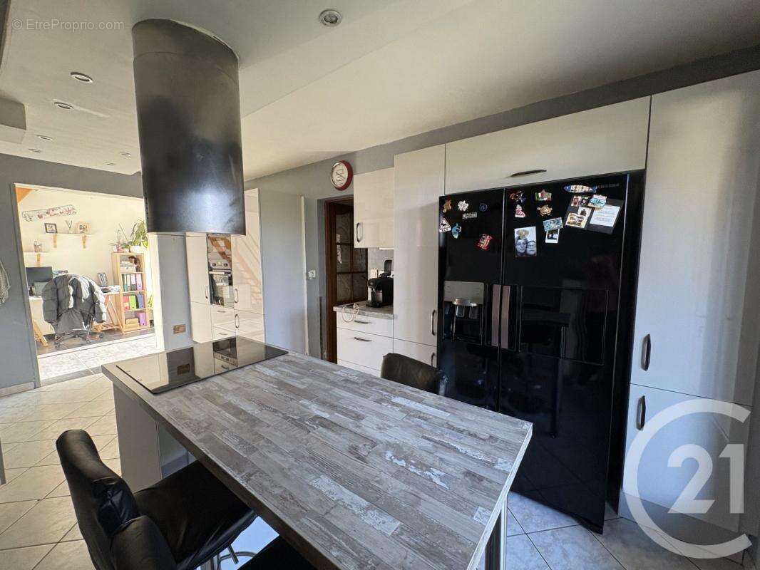 Maison à MOGNEVILLE