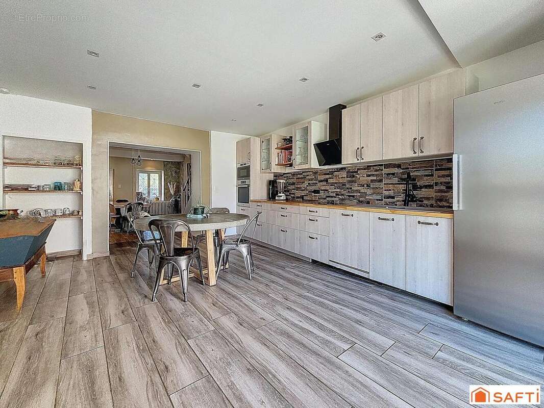 Photo 2 - Maison à CHARVIEU-CHAVAGNEUX