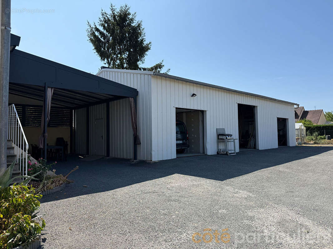 Coup de coeur à Orval : maison rénovée et dépôt d'artisan de 115 m² - photo 12