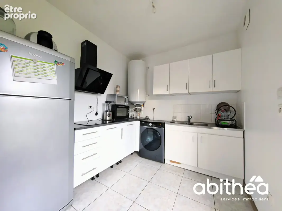 Maison F4 rénovée de 69 m2 en plein cœur des Billaux ! - photo 3