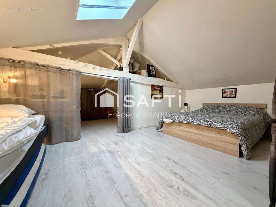 Maison 105 m² à Genouille  - photo 9