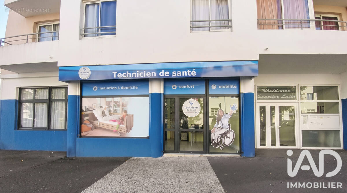 Photo 1 - Commerce à SAINT-DENIS