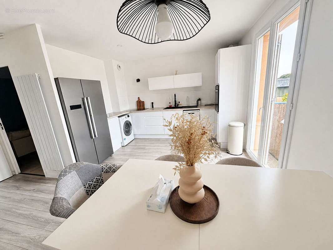 Appartement T2  au centre de Béligneux/ La Valbonne avec garage - photo 2